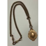 A late 19th century rose gold curb link Albert chain, with T-bar and 9ct gold fob, marked 375, 25.9g