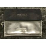 A lady's Prada Vitello Metal Nero black patent leather purse, fitted with zipped compartment,