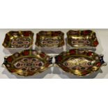 A set of three Royal Crown Derby 1128 Imari pattern shaped rectangular trinket dish, solid gold