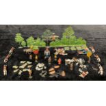A set of miniature cold painted lead farm animals, figures and tractor, wagons, scarecrow, ,