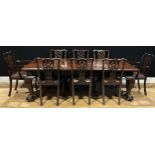 A George II Revival mahogany dining table, rounded rectangular top, cabriole legs, ball and claw