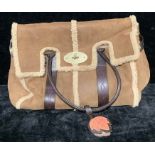 A lady's Mulberry Bayswater sheepskin and brown leather handbag, fastening with a brass screw clasp,