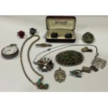 A lady's silver open face pocket watch; a silver fob; a cameo lava brooch; a pair of silver cuff