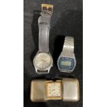 A Seiko five day/date wristwatch; a Casio alarm chronograph; a slide purse watch
