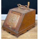 An Aesthetic Movement walnut and beaten copper coal box, c.1880