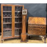 An early-mid 20th century mahogany bookcase or display cabinet, 153cm high, 89.5cm wide, 28cm