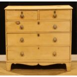 A late 19th/early 20th century pine chest, of two short and three long graduated drawers, 104cm