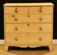 A late 19th/early 20th century pine chest, of two short and three long graduated drawers, 104cm