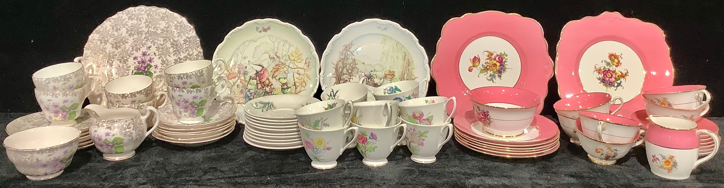 A Foley China tea service for six, decorated with flowers within a broad pink border, comprising