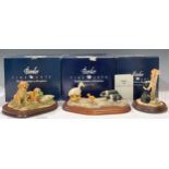 A Border Fine Arts resin model, Labrador Pups With Decoy Duck (Yellow), plinth base, number 123B,