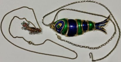 A silver and enamel reticulated fish pendant, 4cm, suspended from a base metal necklace chain; a