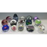A Caithness glass paperweight, Salome, limited edition 86/350; others, Laser, 136/750; Moonflower