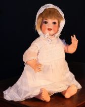 A Heubach Koppelsdorf (Germany) bisque head and painted composition bodied doll, the bisque head