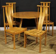 An Ercol beech and elm drop-leaf dining table, 71.5cm high, 63cm opening to 124.5cm long, 113.5cm