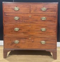 A Post-Regency mahogany chest, of two short and three long graduated drawers, 99.5cm high, 96.5cm