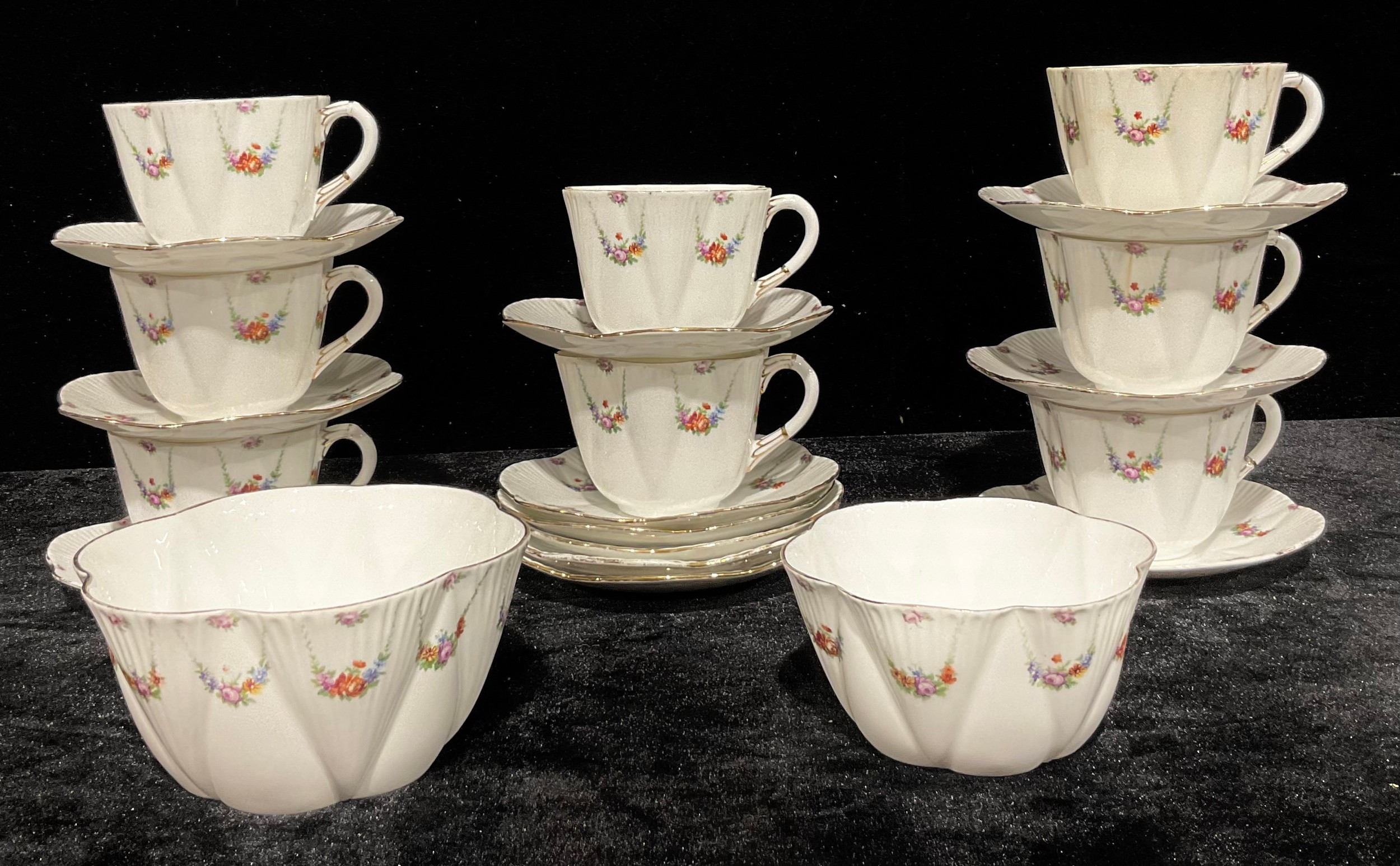 A Foley Wileman tea set comprising eight breakfast teacups, twelve saucers, slop bowl and sugar