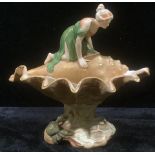 A Royal Dux table centre, female figure with conch shell, 25cm, impressed number 2610, pink triangle