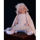 An Armand & Marseille (Germany) bisque head and painted composition bodied 'Dream' baby doll, the
