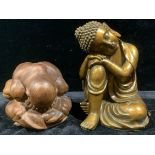 A carved hardwood figure, Weeping Buddha, 14cm high; another, resin model, of a seated Buddha (2)