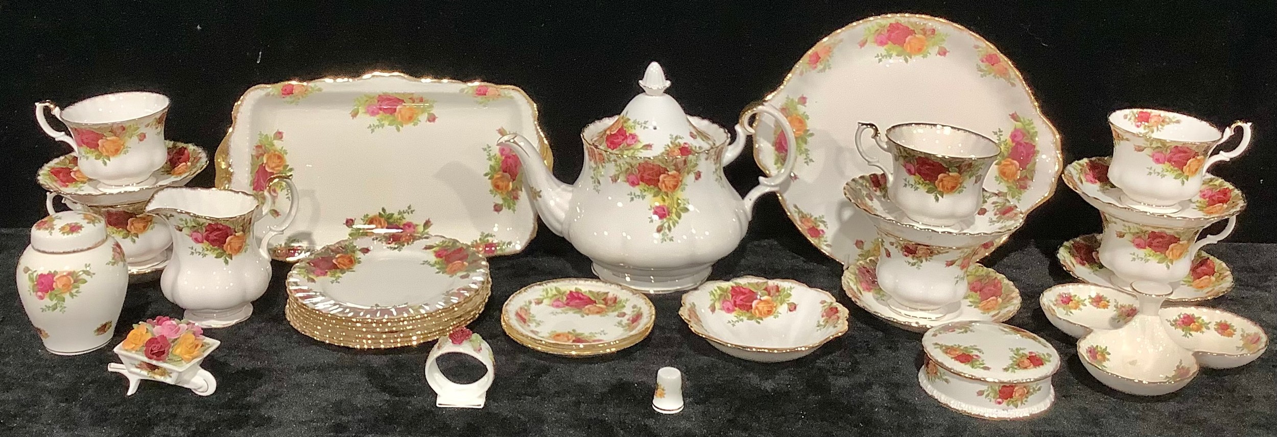 A Royal Albert Old Country Roses pattern teapot, six teacups, saucers and tea plates, milk jug,