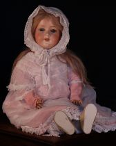 An Armand & Marseille (Germany) bisque head and ball jointed painted composition bodied doll, the