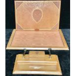 A French tan leather desk blotter and standish, embossed with a fleur de Lis, tooled gilt borders,