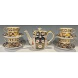 A Royal Crown Derby Imari 2451 pattern teapot, 16.5cm, second quality; a set of four 2451 pattern