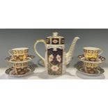 A Royal Crown Derby Imari 2451 pattern coffee pot, 23cm, second quality; a set of four 2451