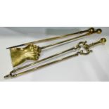 A set of three Victorian brass fire irons