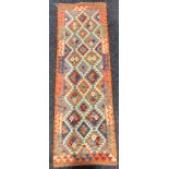 Carpets - a Chobi Kilim runner or rug, multi-coloured geometric shapes and motifs, 198cm x 63cm