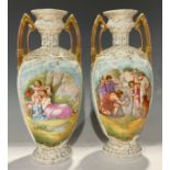 A pair of Sitzendorf flattened ovoid two handled pedestal vases, transfer printed with cupids and
