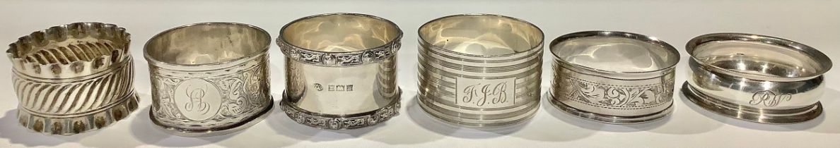 A silver napkin ring, Birmingham 1895; other silver napkin rings; 116g (6)