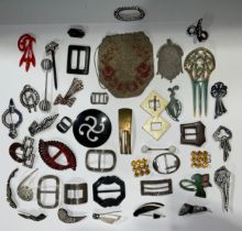 A collection of 1920's Art Deco hair slides and clips; a collection of buckles; beadwork evening