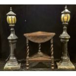 A pair of garden floor lights, reconstituted stone pedestals, 117cm high; an oak occasional table,
