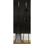A 19th century steel and brass fireside companion set, comprising shovel and tongs, the shovel