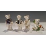 A Royal Crown Derby miniature model bear, Footballer, black & white stripes, 9cm, printed mark;