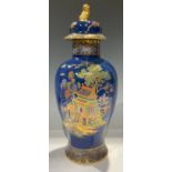 A Carlton Ware Pagoda pattern baluster vase and cover, printed and painted with pagoda and