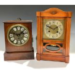 A wooden mantel clock, 37cm high; another, mahogany, converted to battery, 28cm high (2)