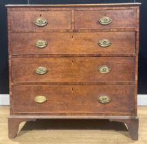 A George III mahogany banded oak chest, of two short and three long graduated drawers, 100.5cm high,