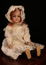 A Simon & Halbig (Germany) bisque head and ball jointed painted composition bodied doll, the