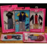 A collection of Mattel Barbie Ken doll clothing/outfit sets including Fashion Avenue sets, each