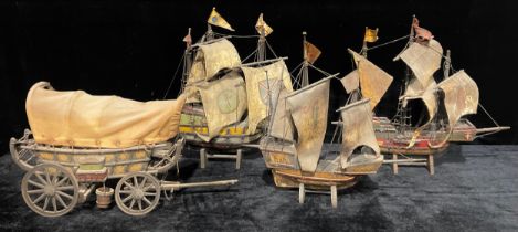 A scratch built painted wooden model of a Man O' War ship, hide sails, stand, 47cm overall; others