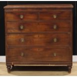 A George III mahogany chest, of two short and three long graduated drawers, loose ring lion mask