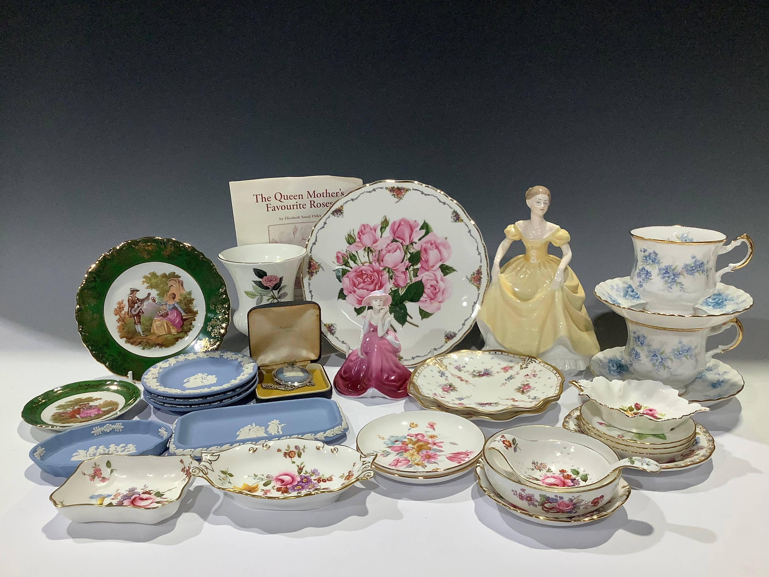 A Coalport figure, Emily; another smaller, In Love; a pair of Royal Crown Derby Royal Antoinette