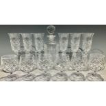 Glassware - a cut glass decanter, six Champagne flutes, six brandy glasses