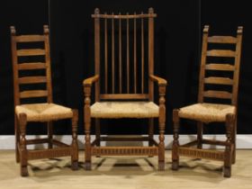 A harlequin trio of oak dining chairs, probably Rupert/Nigel Griffiths Monastic Woodcraft, one