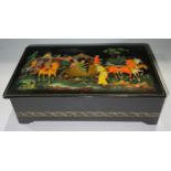 A Russian lacquered cigarette box, the hinged cover painted with Imperial procession, signed, 20cm