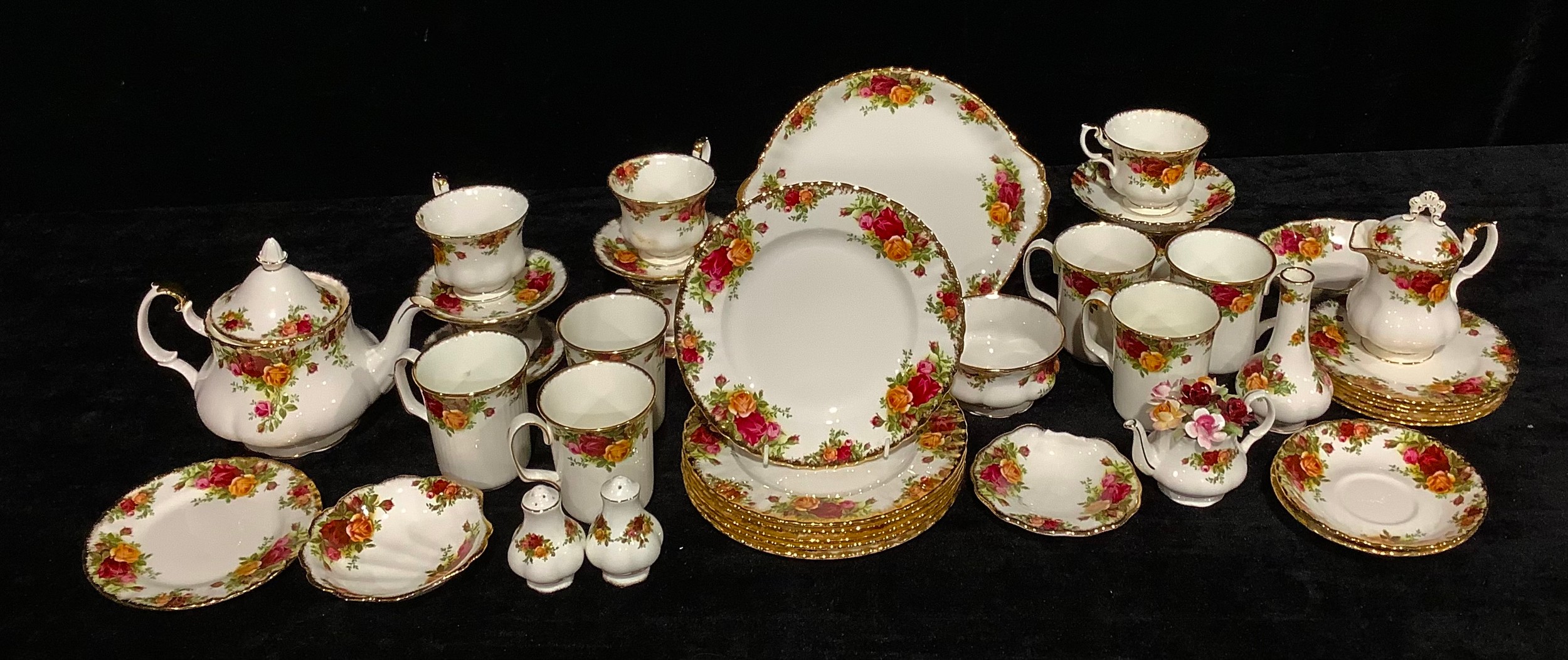 A Royal Albert Old Country Roses pattern teapot, cups and saucers, plates, milk and sugar, salt