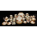 A Royal Albert Old Country Roses pattern teapot, cups and saucers, plates, milk and sugar, salt