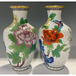 A pair of Chinese cloisonne ovoid vases, decorated in polychrome with flowers and butterflies,